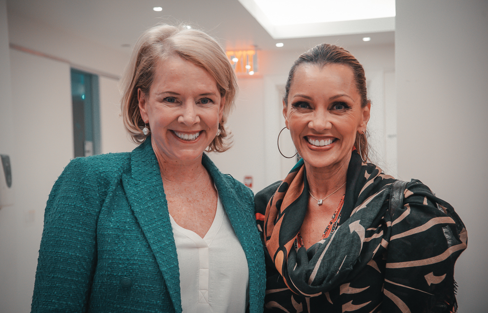 Two women photographed together at a New York event by Rory Duffy