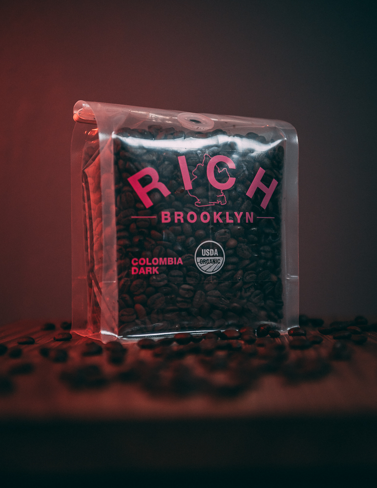 Rich Brooklyn coffee photographed in dramatic red and teal product lighting by Rory Duffy